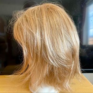 Jacqueline Smith “Style” wig. Mid length layered Bob with fringe bangs. Not worn